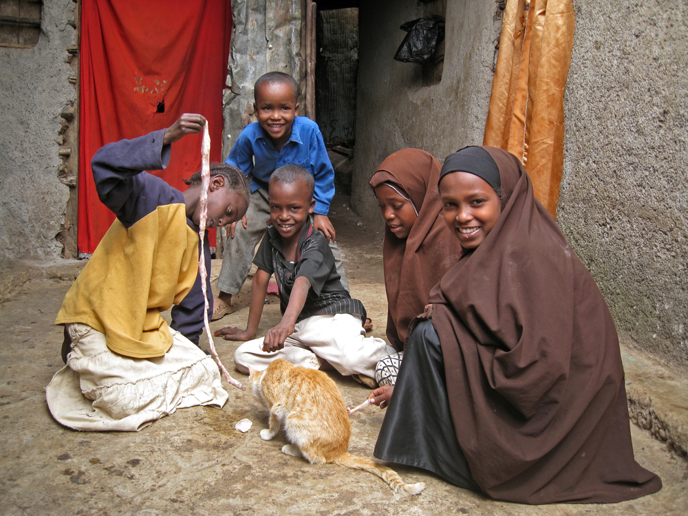 Children on holiday from school play outside their home in the Korogocho slum in Nairobi, Kenya