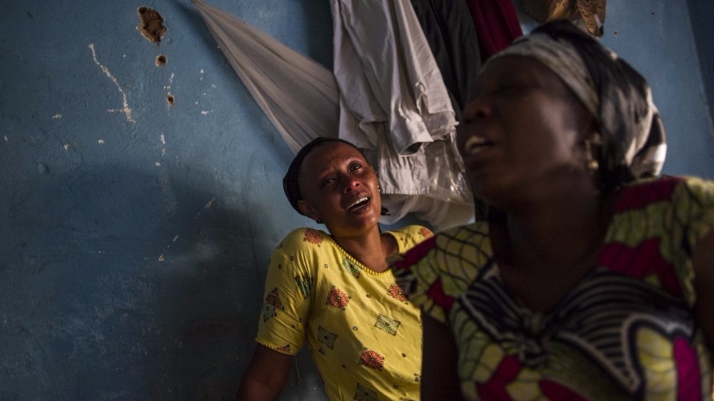 Relatives of a student killed in the Jabe neighbourhood of Bujumbura mourn