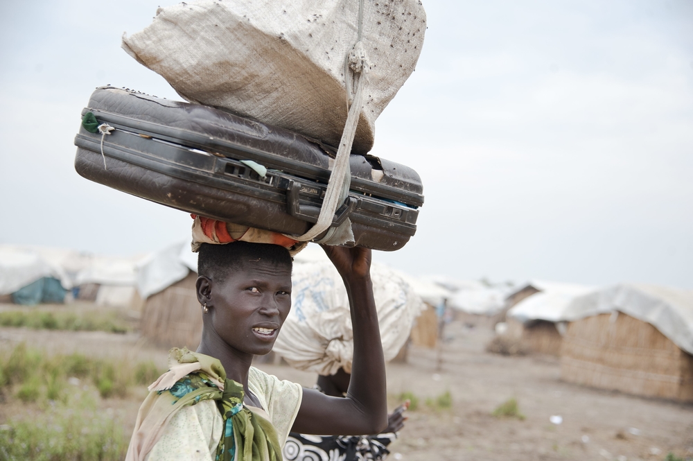 Nyakong, 22, has been hiding in a village near Nasir, South Sudan, and surviving off cow's milk for months. The village is unsafe, but the floodwaters are too high to bring her three young children to Leitchuor refugee camp in Ethiopia.