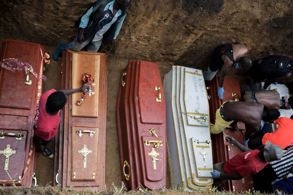 Victims of a massacre last year in the outskirts of Bunia are laid to rest in a mass grave.