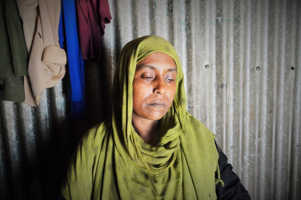 Jamila Begum, whose son, Mohammad Selim, was abducted and murdered, poses for a portrait in Kutupalong camp, Bangladesh.