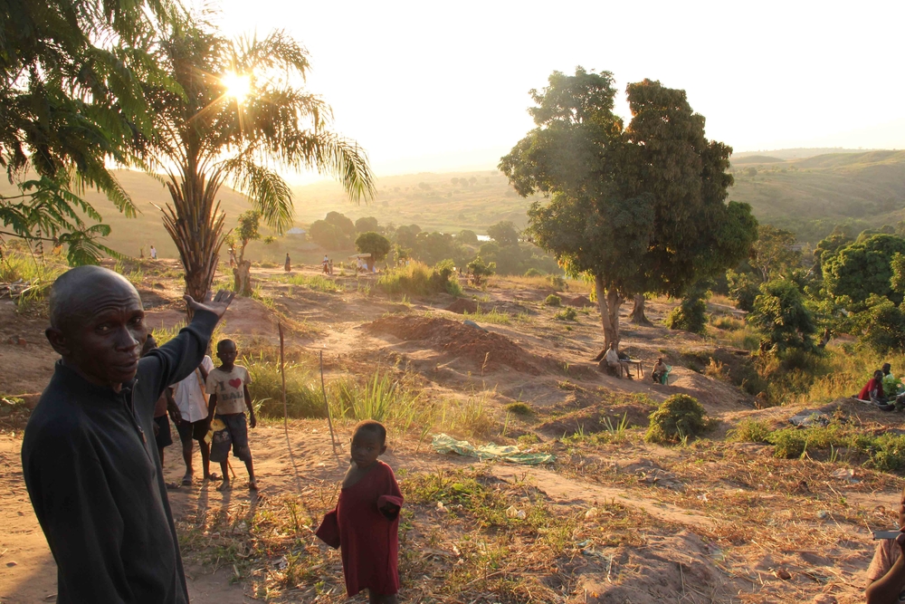 Displaced civilian points to site of dismantled IDP camp
