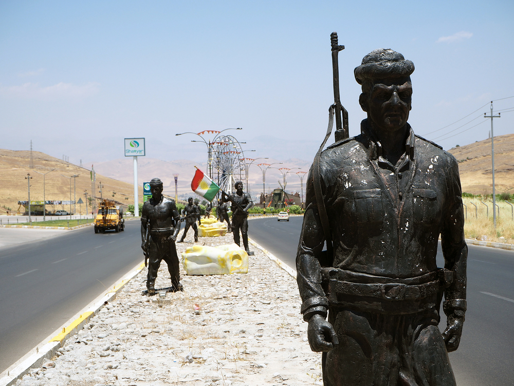 Peshmerga statues in the middle of the highway leading to the KRG city of Zakho.
