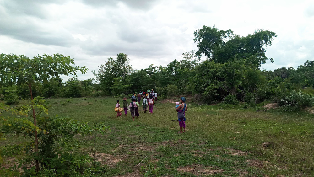 Displaced people flee violence near the town of Tabayin in Myanmar’s Sagaing Region on 2 July 2021. Farmers say the February coup has worsened food insecurity.
