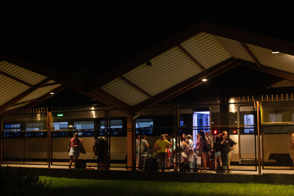 At the train station in Przemyśl, Poland, people wait to board a long-delayed train to return to Ukraine on 25 June.