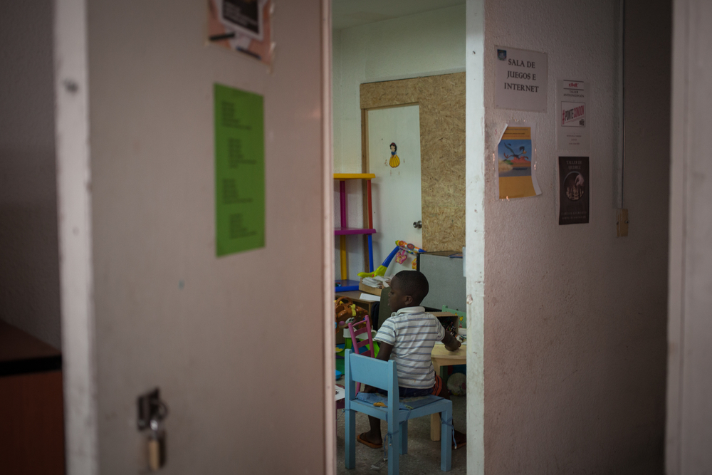 A boy plays at a shelter for migrants and refugees in Mexico City