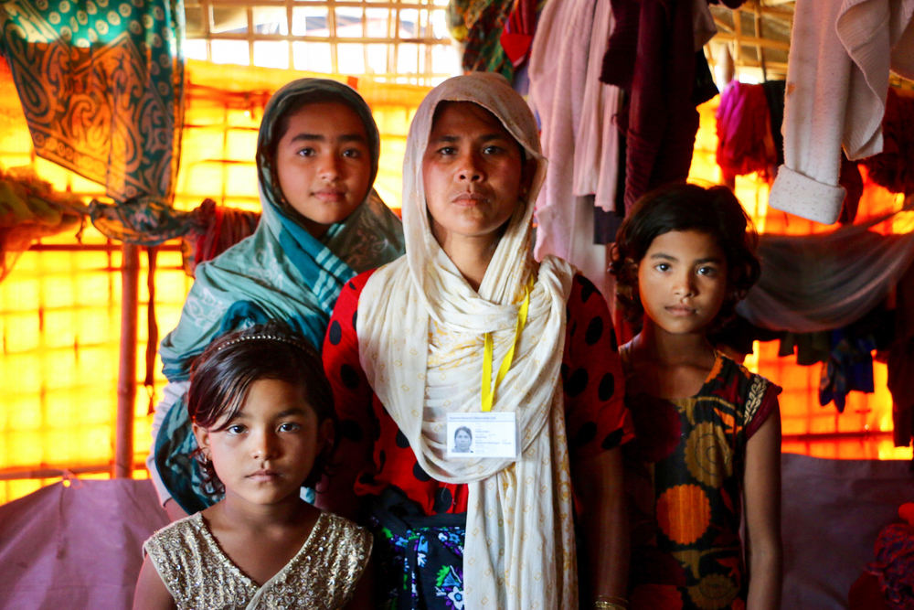 Hasina Khatun says she ran into her burning home to save her family's ID cards.