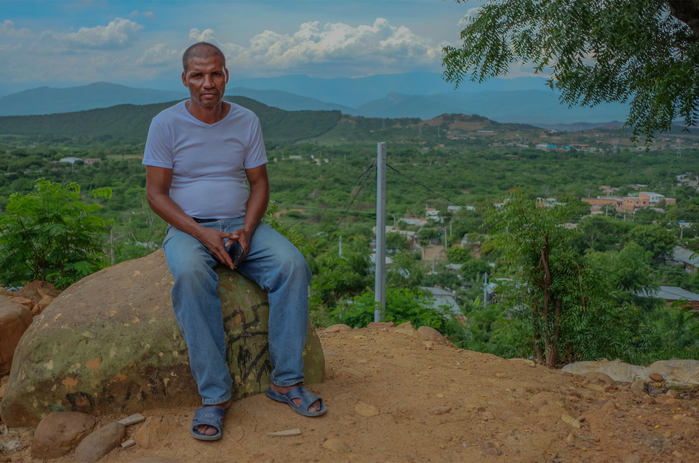 José Luis Zabaleta, Las Delicias community leader, sitting on top of the neighbourhood's highest hill.