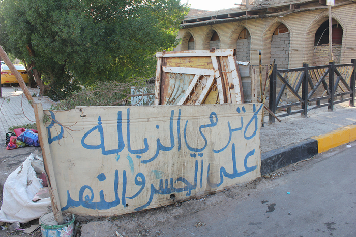Graffiti at a canal in Basra's Old City reads: