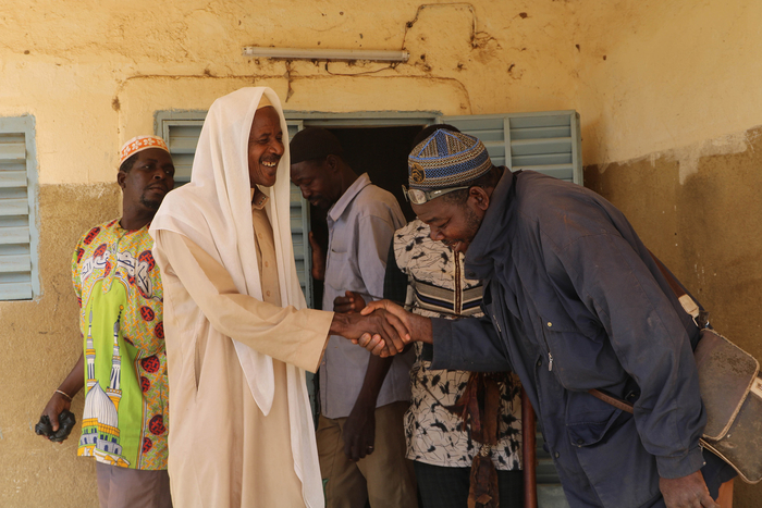 An image of a group of Koglweogo members paying respects to their leader Boureima Nadbanka