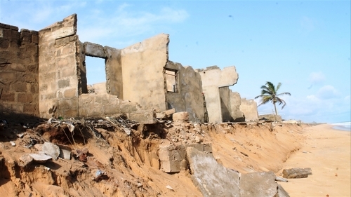 A home destroyed by rising sea levels in Togo, West Africa.