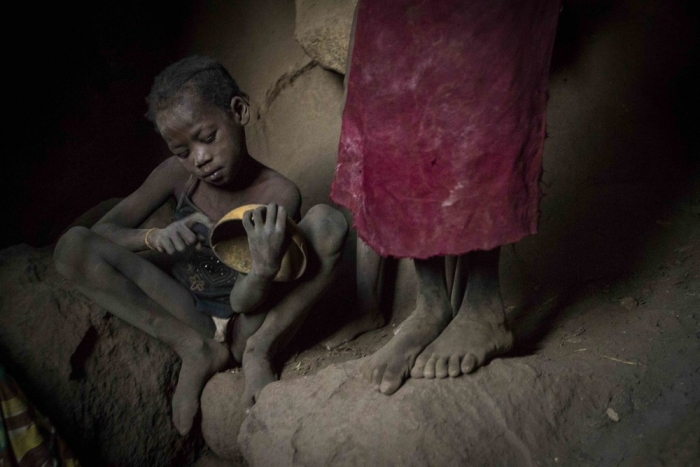 Children hide in cave Sudan