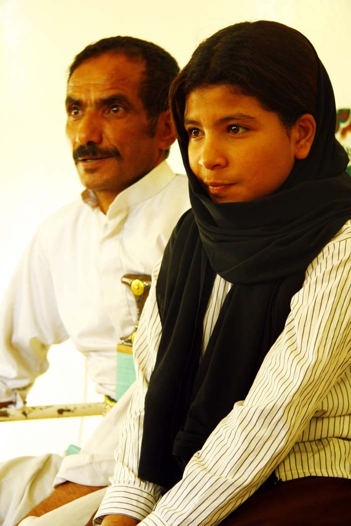 Former child bride Nojood made headlines worldwide when at the age of nine she was granted a divorce. Today she lives with her father (left) and rest of her family