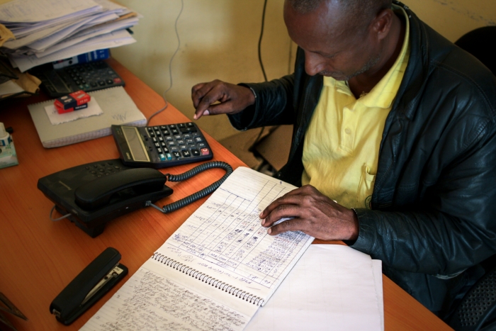 Luel Abera, reception coordinator at the Adinbried entry point, keeping track of the number of Eritrean arrivals.