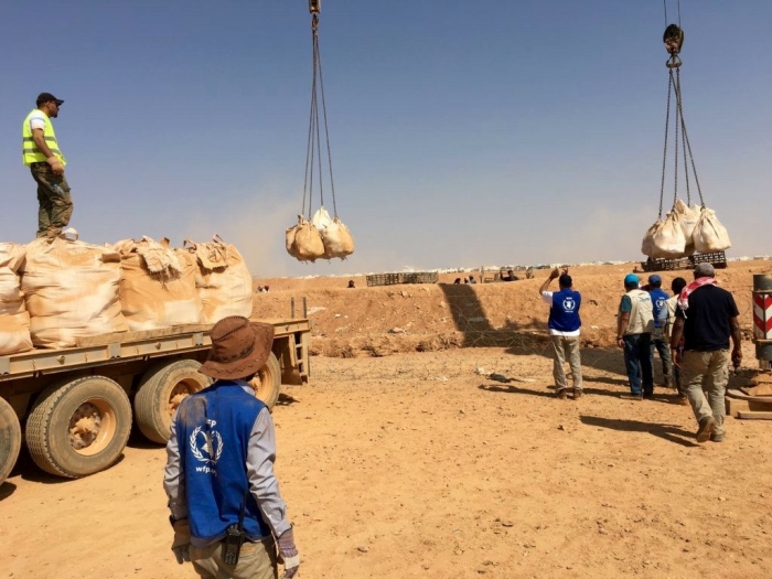 WFP used a crane to lower food for refugees into a no-go zone at the Jordan-Syria border