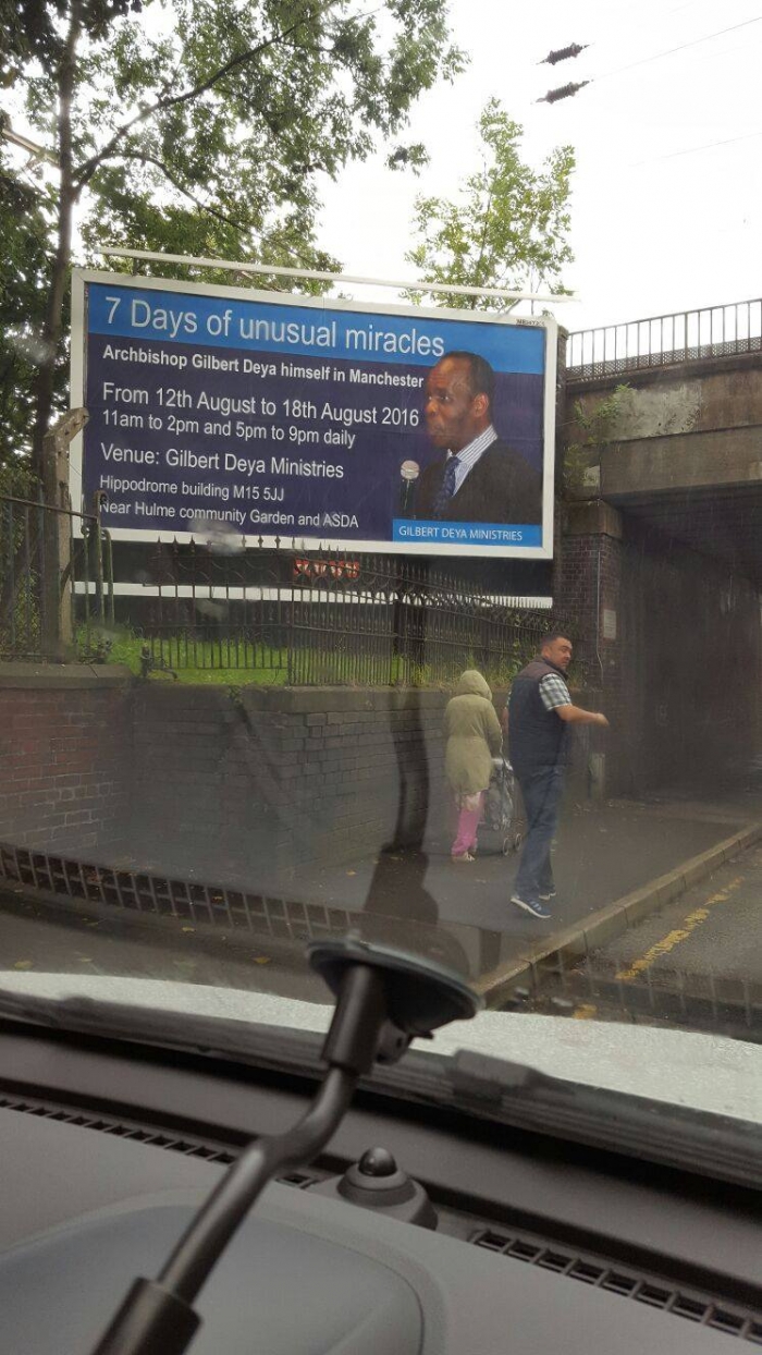 A billboard detailing Gilbert Deya \