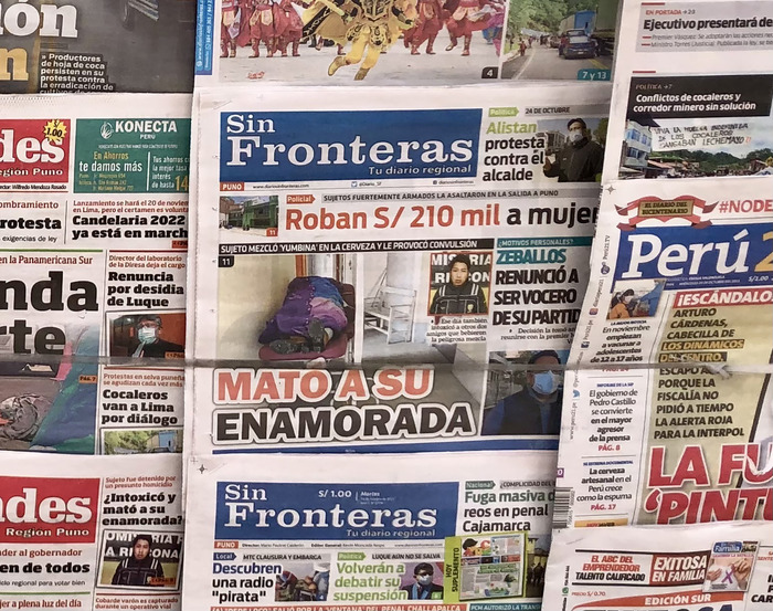 Local reporting on a recent femicide at a newsstand in Puno, Peru in October 2021.