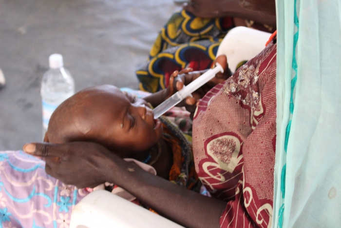 A severely malnourished child receives treatment in a clinic in Banki, north-east Nigeria