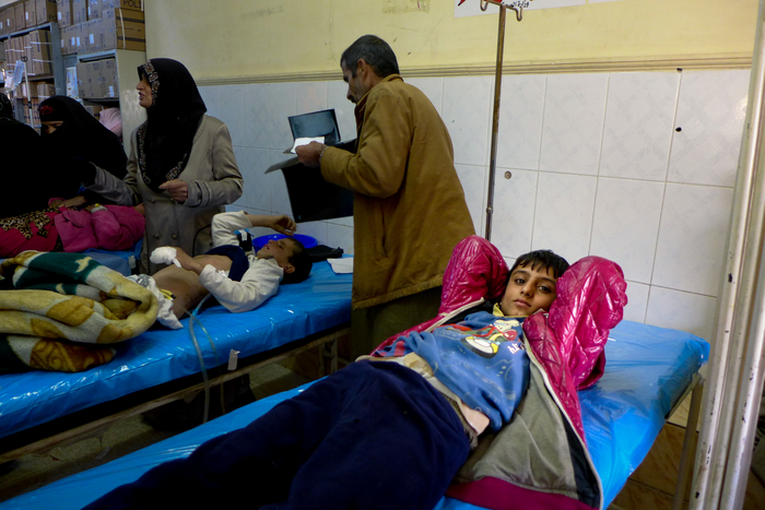 Boy on hospital bed