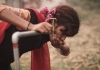 A girl drinks directly from a public tap in Nawalparasi installed
last year, promising arsenic-free water to users; education for proper use and maintenance of arsenic mitigation technologies remains a challenge for government and stakeholders