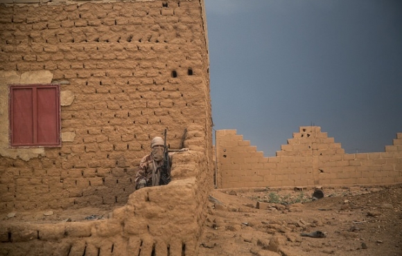 A member of the the CMA (Coordination des Mouvements de l'Azawad) secure the perimeter of the CMA HQ during the visit of Major General Michael Lollesgaard, Force Commander of the United Nations Multidimensional Integrated Stabilization Mission in Mali (MI