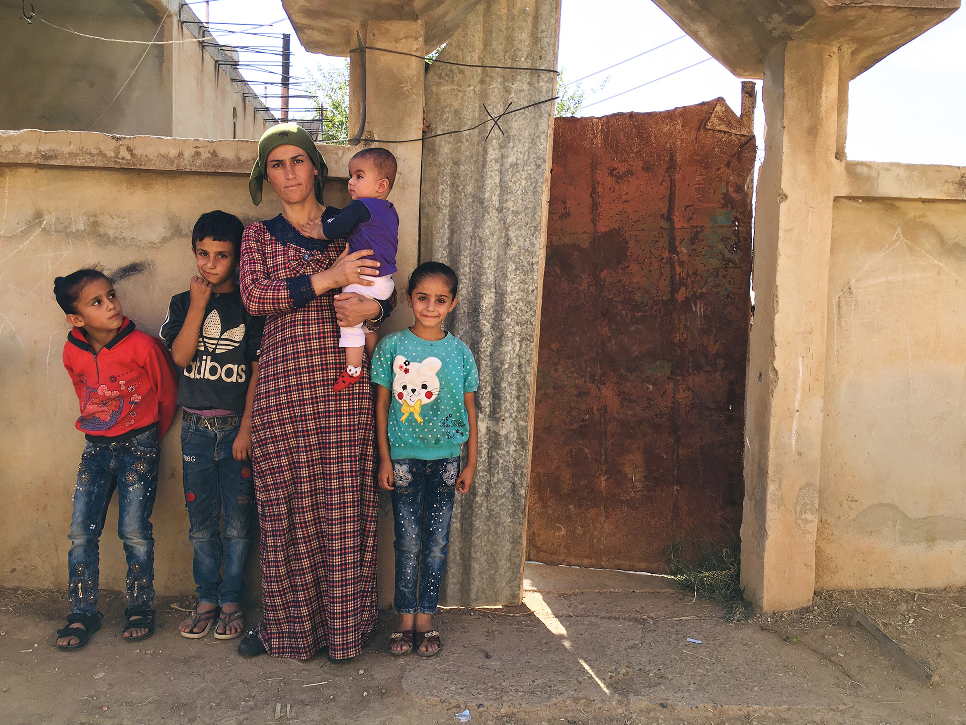 Rosa Nabu and her family fled the border town of Ras al-Ayn, and have found refuge in the largely abandoned Assyrian Christian town of Tel Nasri.