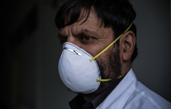 A doctor wears a face mask at the Afghan-Japan Communicable Disease Hospital in Kabul. The hospital has been designated the main treatment facility for coronavirus patients in Afghanistan’s capital.
