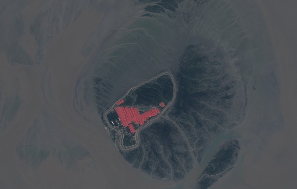 A satellite image taken on 12 November 2019 shows barracks-style construction on Bhasan Char island on the Bay of Bengal.