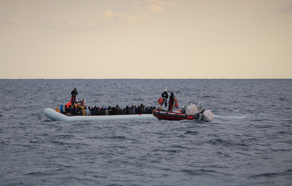 Migrants float on a rubber dinghy during a rescue operation by the MSF-SOS MEDITERRANÉE-run Ocean Viking ship off the Libyan coast, 18 February 2020.
