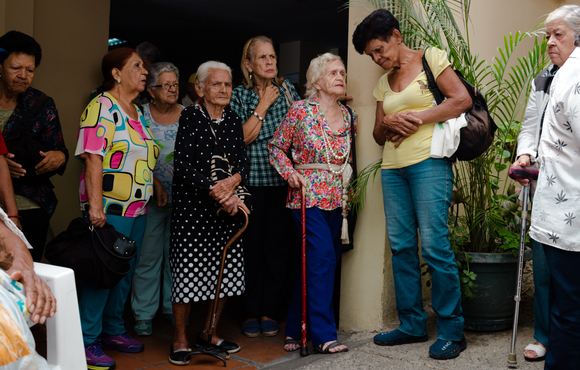 The Club of Revolutionary Grandparents in La California, Venezuela serves as a lifeline for elderly, providing medical care, food, and entertainment to those who are able to attend.