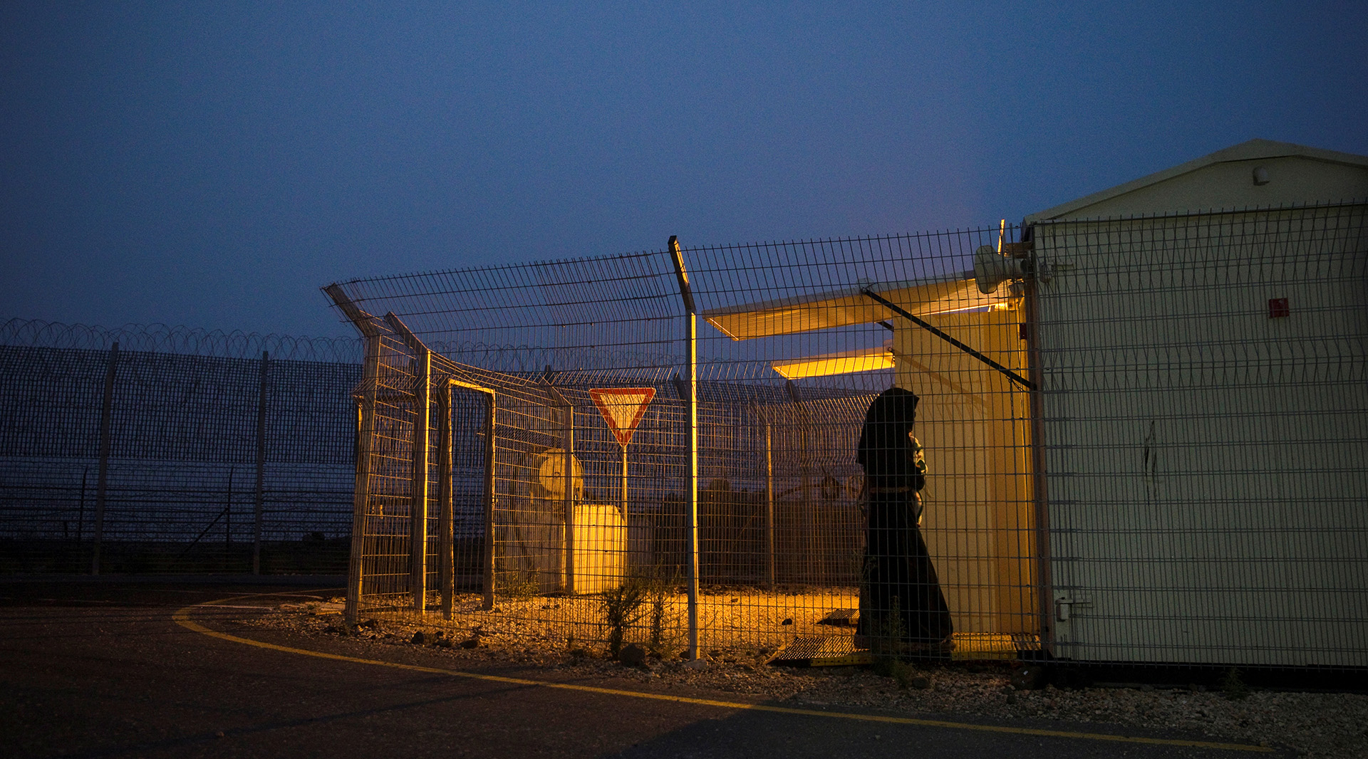 A Syrian woman crosses the armistice line to the Israeli-occupied Golan Heights to get medical treatment.