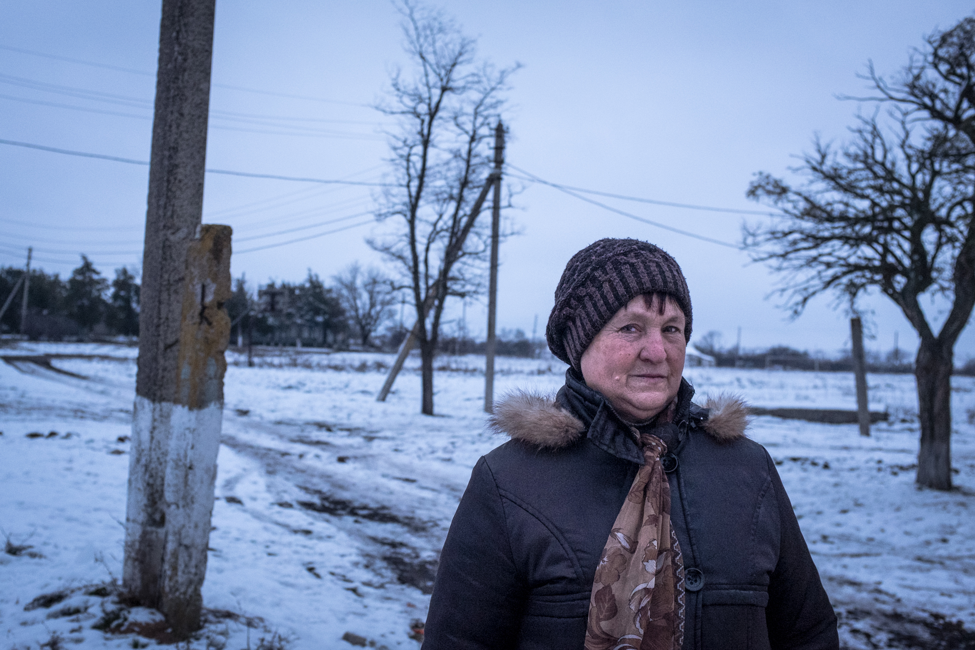 Vera, a resident of the village of Nykyforivka, must singlehandedly rebuild her house that was destroyed by the bombs of separatist forces.