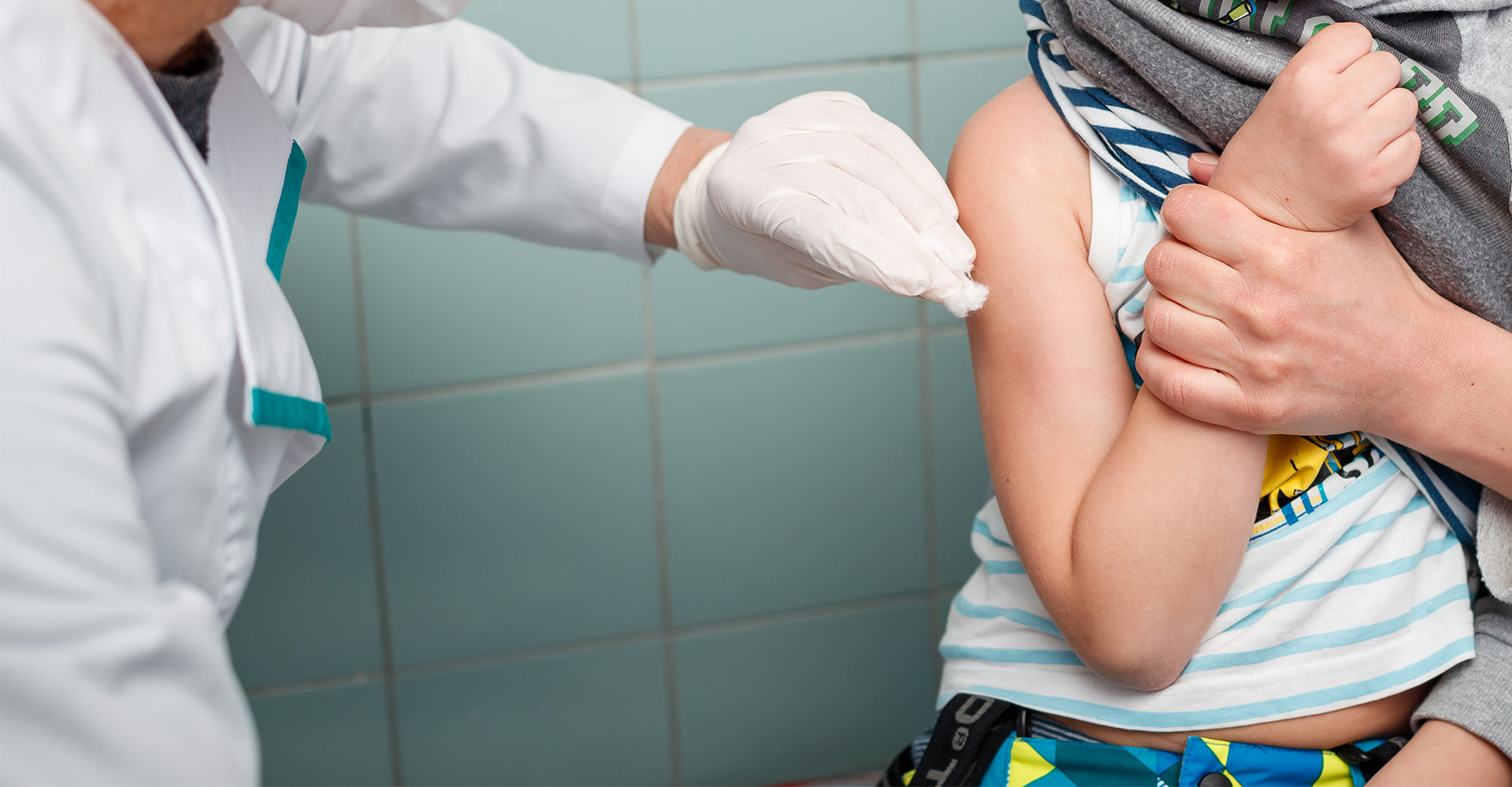 Photo of young boy getting Measles shot in Ukraine.