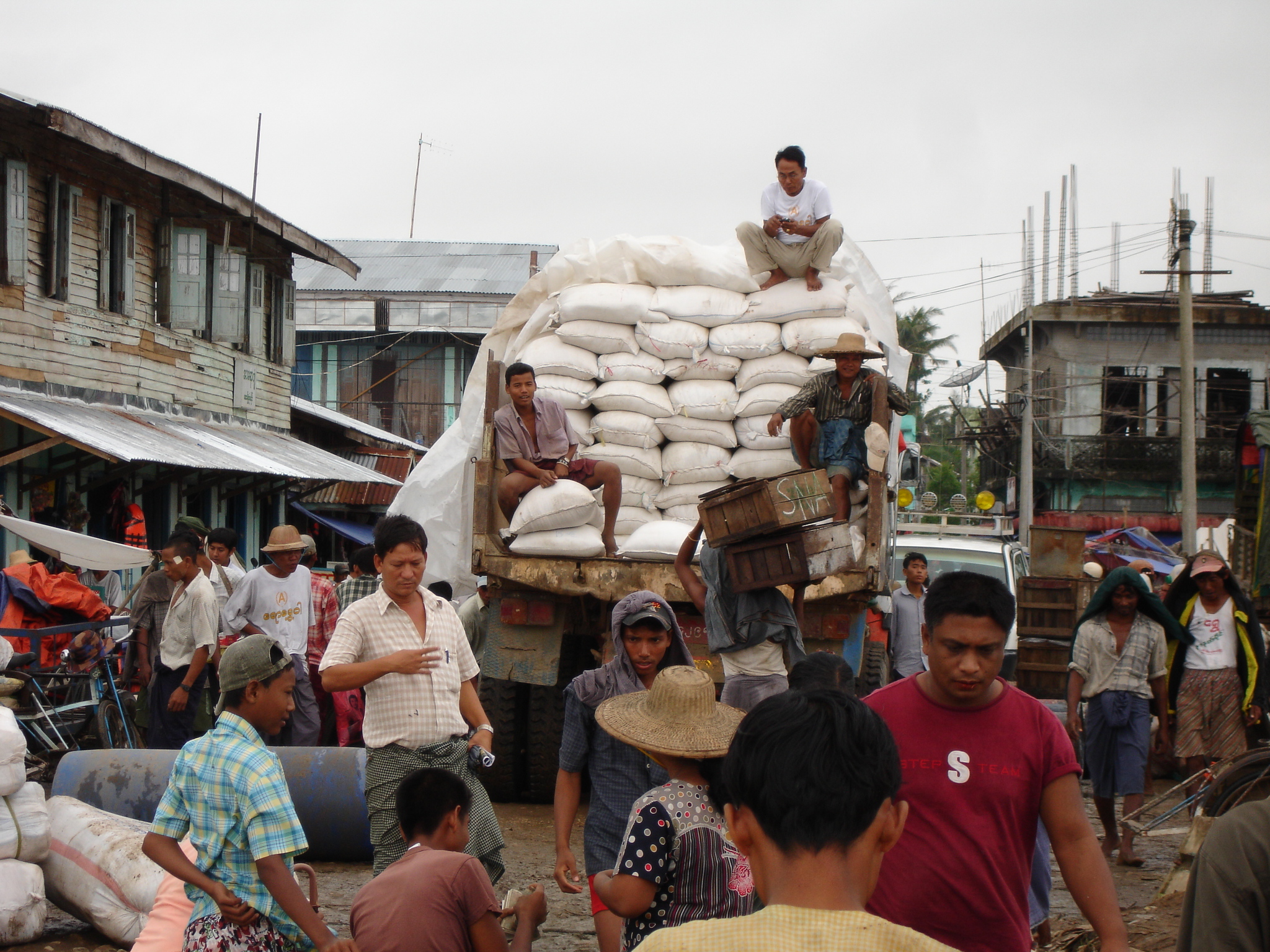 Food assistance being offloaded in Labutta, southern Myanmar. Hundreds of thousands of survivors