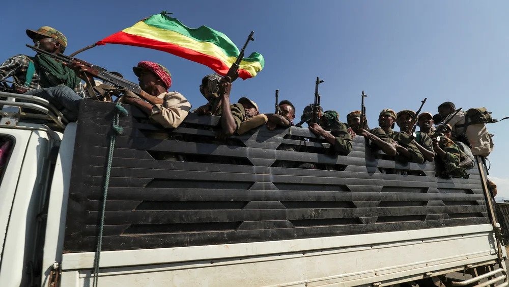 Militiamen head to the front line in Sanja, Amhara region, near the border with Tigray, in 2020.