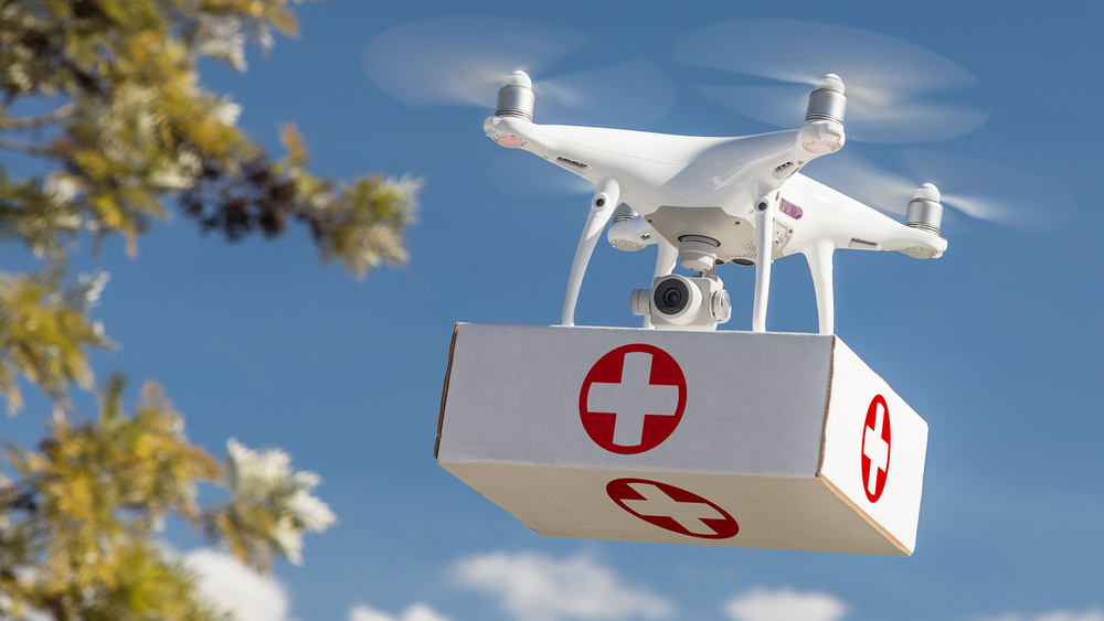 A drone carrying a first aid package