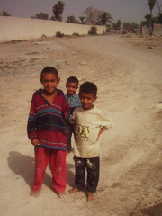 [Iraq] Street children sell gum and sweets everyday in the capital, Baghdad.