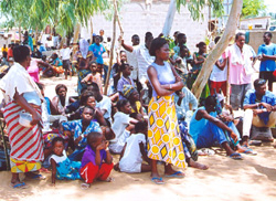 [Togo] Togolese refugees wait at the Hilakondji border station in Benin. They have fled their homeland after violence erupted following a disputed 24 April presidential poll.