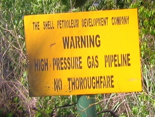 Oil company sign near Port Harcourt in the Niger Delta region.