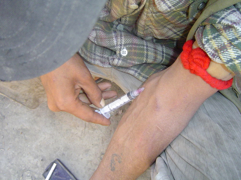 An Afghan man injects heroin in Kabul.