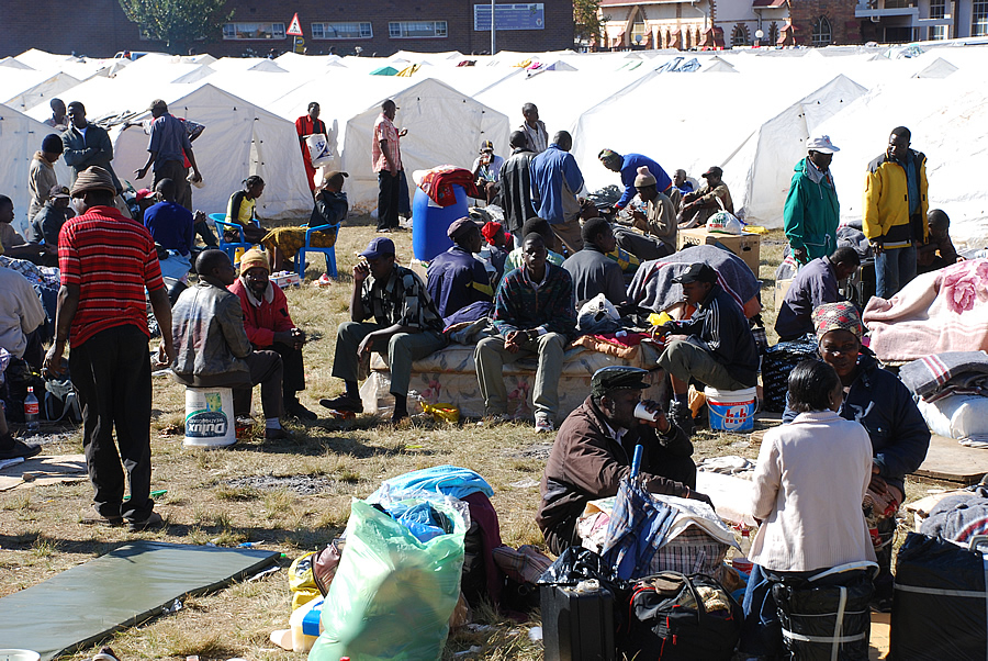 Displaced camped at Primrose police station.