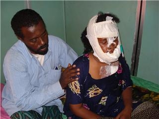 Abdullahi Osman, with his family who were injured in the last round of fighting in Mogadishu, Somalia.