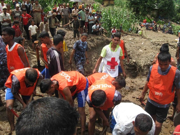 Rescue worker on the scene of a landslide in July 2011. Incessant rains have resulted in landslides across parts of Nepal