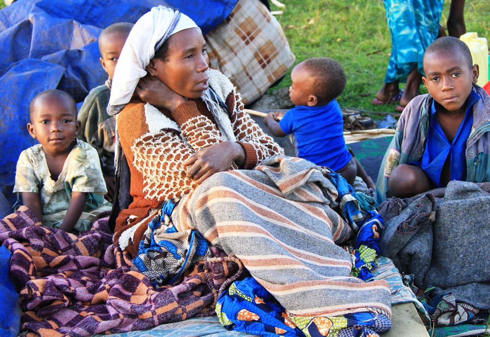 A Congolese refugee woman and her children at Nyakabande transit centre, Kisoro district, Uganda. May 2012