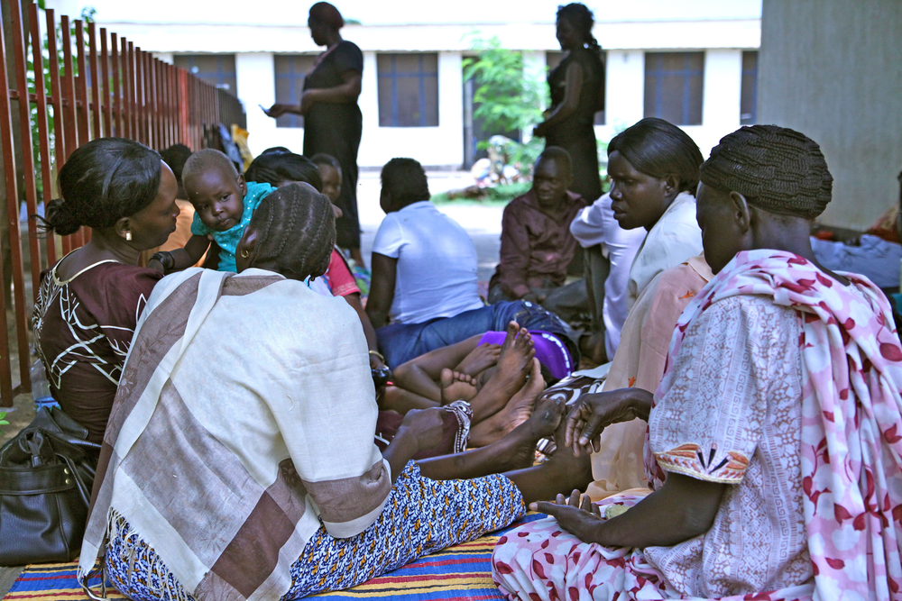 Women wait outside Juba Teaching Hospital’s cramped maternity ward