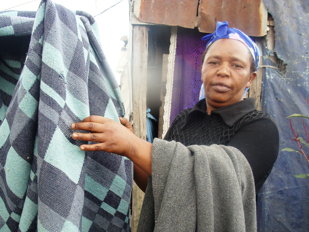 Jane Njeri – Personne déplacée au Kenya Jane Njeri, 36, is a single mother of four living with her family in a camp for internally displaced persons (IDPs) in Nakuru