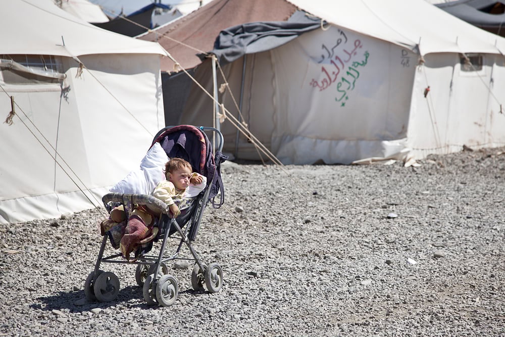 A baby in Turkey's Islahiye camp for Syrian refugees