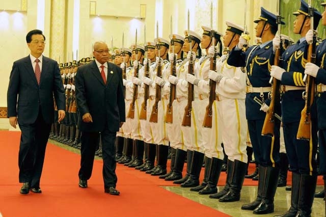 Untangling China's aid to Africa President Zuma with President Jiantao observe the Chinese Presidential guard during the welcome ceremony. President Jacob Zuma was officially welcomed to China by President Hu Jiantao. President Zuma is attending the 5th Forum on China - Africa Cooperatio
