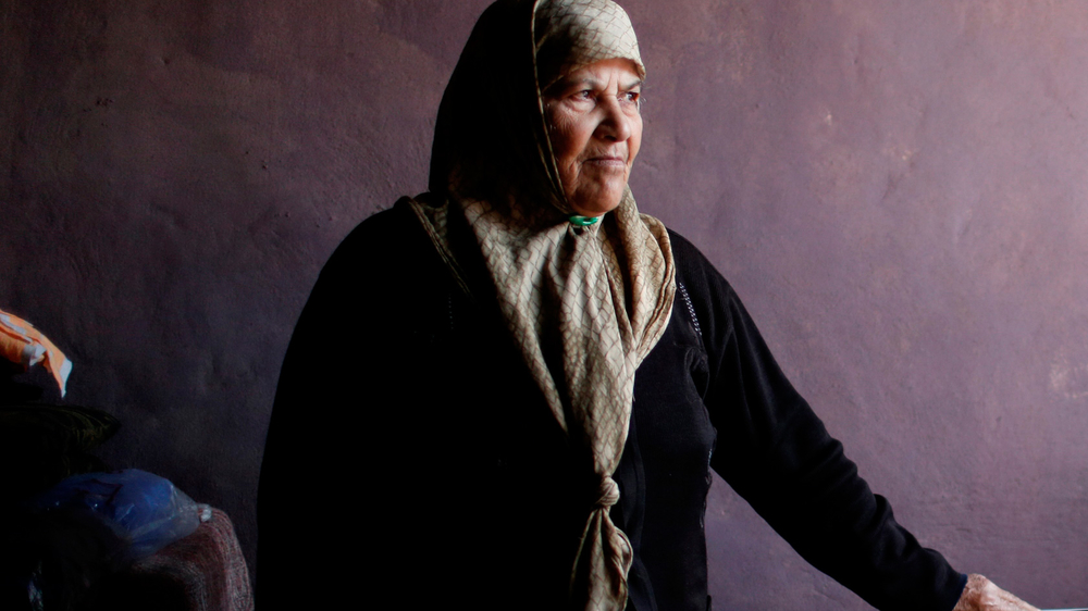 Property rights scarce for Palestinians in Lebanon Nasr Ali mohammad, 69, stands in the kitchen of her home in a Palestinian settlement in Qasrmiyeh, near Tyre in Lebanon, on December 20, 2013. Nasr has lived here for 40 years but due to Lebanese law has no secuity of tenure