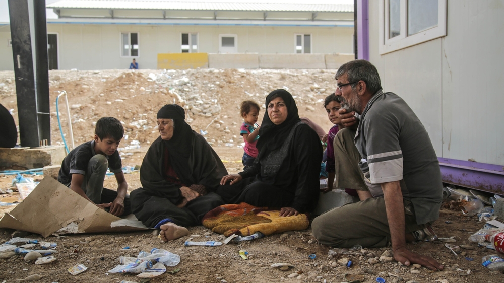 Bushra Alwar, her husband and 10 members of their family walked from their farm outside Mosul four days ago, to a checkpoint near Erbil city, after militants seized control of the city. They have joined hundreds of thousands of residents of Iraq’s secon